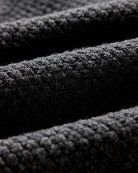 material shot of the fabric on The Fisherman Shawl Cardigan in Heather Coal Merino, Knits by Taylor Stitch