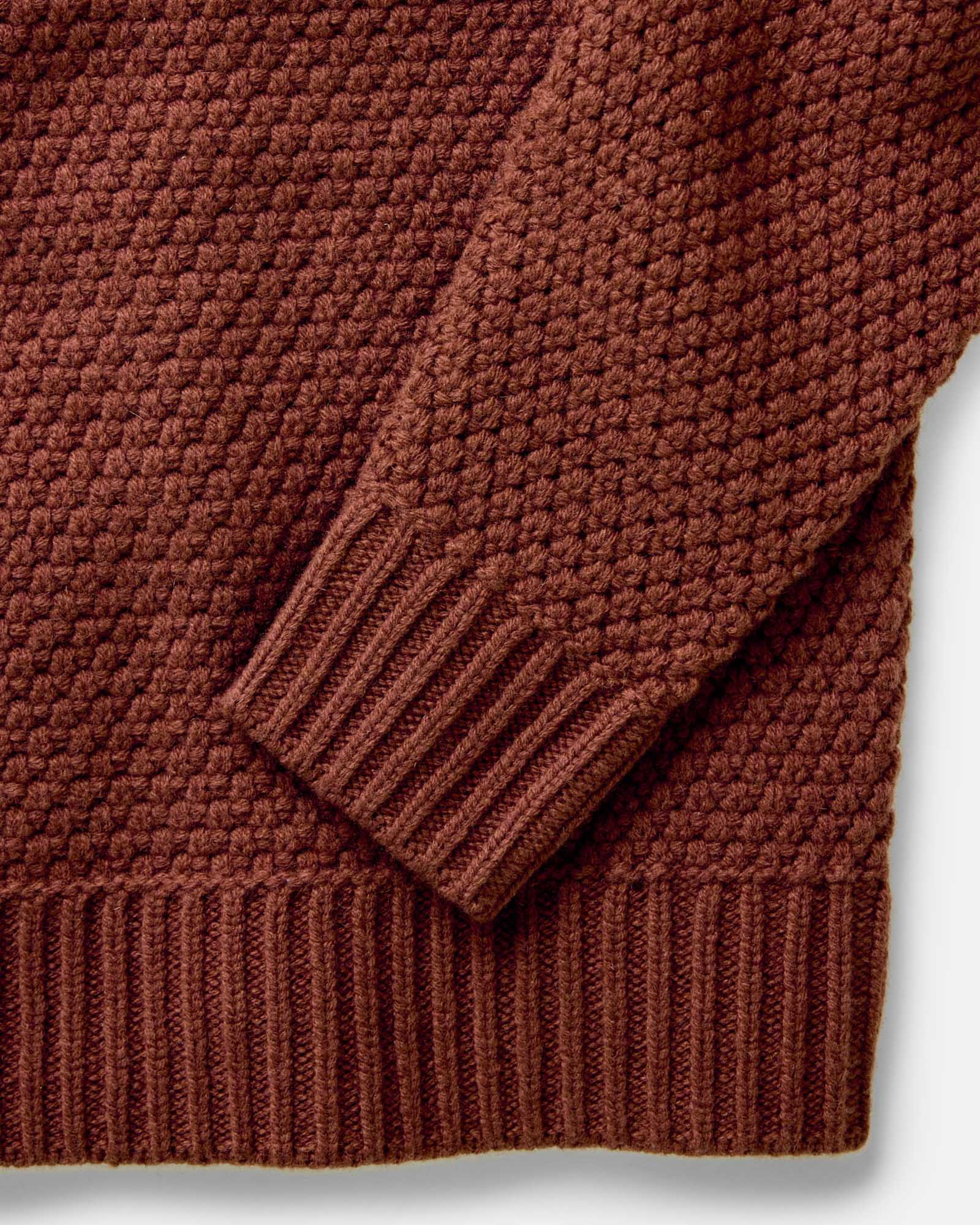 material shot of the sleeve on The Fisherman Sweater in Heather Brick Merino, Knits by Taylor Stitch
