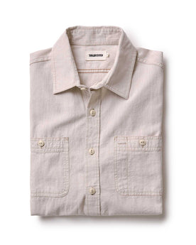 folded flatlay of The Foundry Shirt in Natural Chambray, Wovens by Taylor Stitch