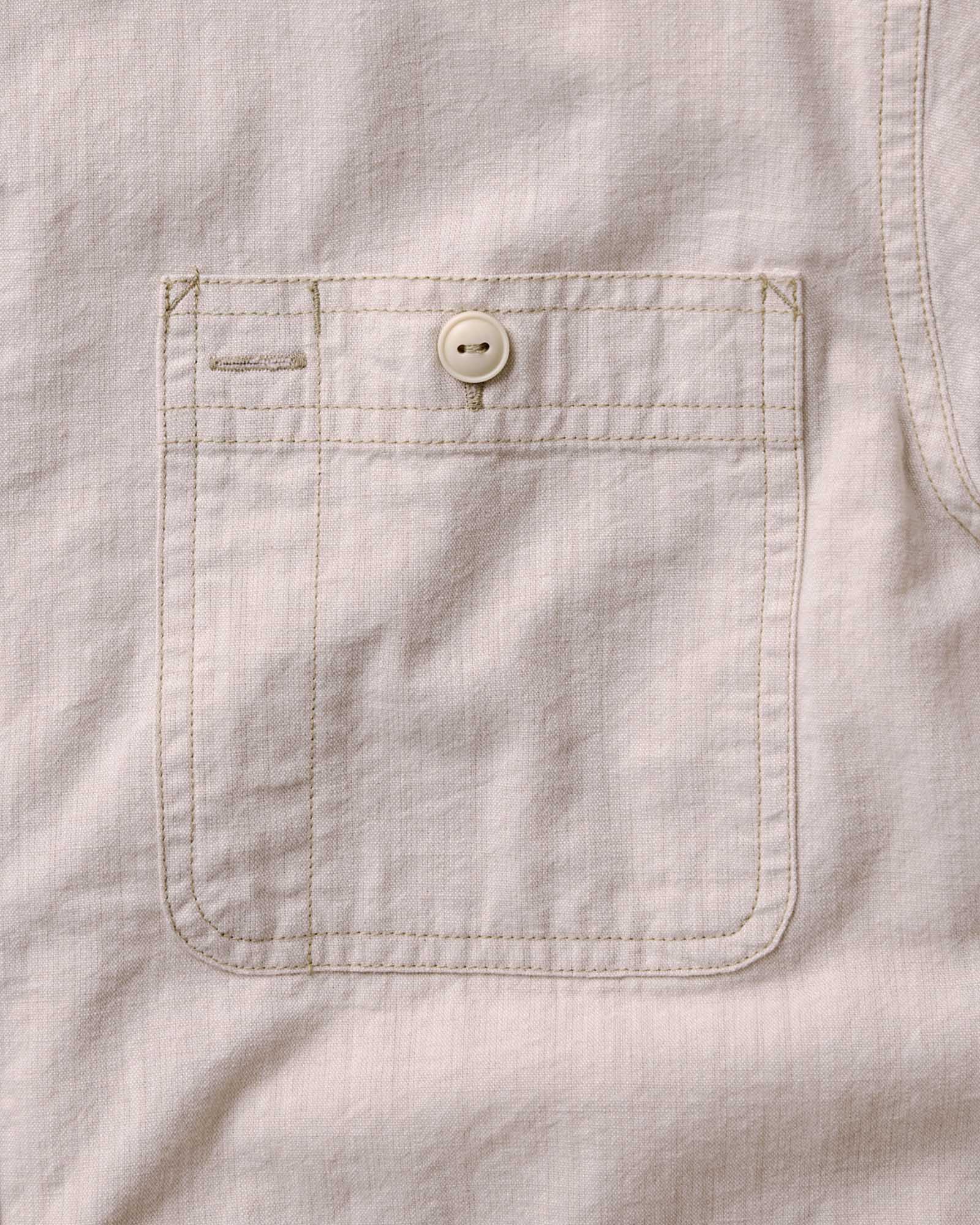 material shot of the pocket on The Foundry Shirt in Natural Chambray, Wovens by Taylor Stitch