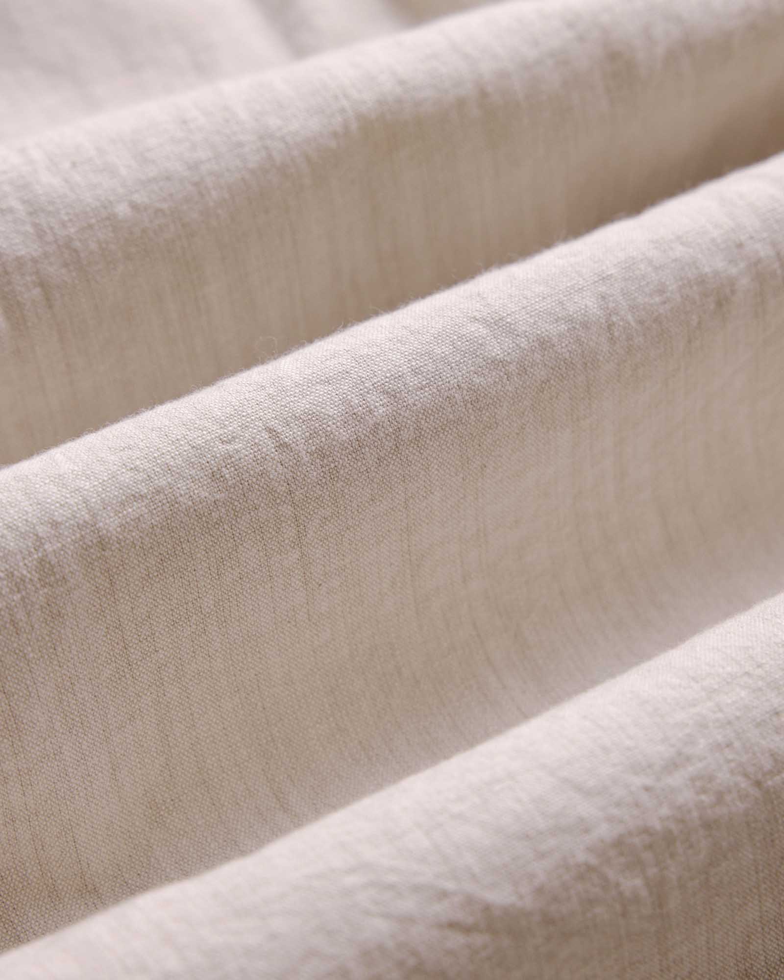 material shot of the fabric on The Foundry Shirt in Natural Chambray, Wovens by Taylor Stitch