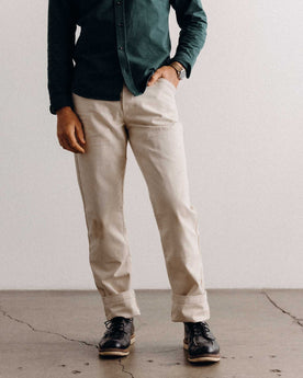fit model posing in The Good Acre Chore Pant in Natural Canvas, Bottoms by Taylor Stitch