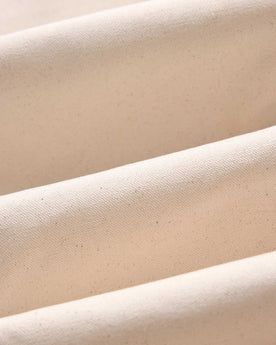 material shot of the fabric on The Good Acre Chore Pant in Natural Canvas, Bottoms by Taylor Stitch