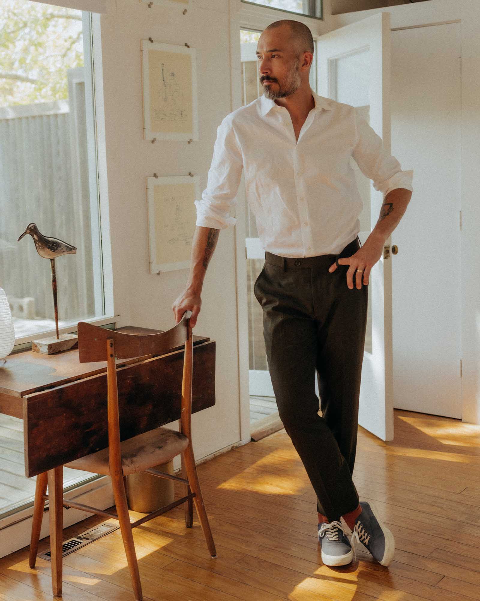 fit model posing in The Hyde Shirt in White Pinpoint Oxford, Wovens by Taylor Stitch