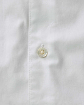material shot of the button on The Hyde Shirt in White Pinpoint Oxford, Wovens by Taylor Stitch