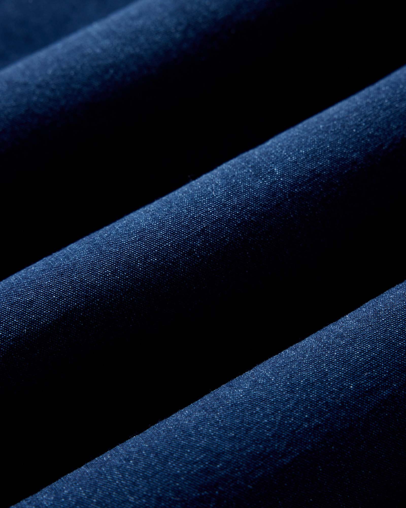 material shot of the buttons on The Jack in Indigo Oxford, Wovens by Taylor Stitch