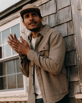 fit model posing in The Ledge Shirt in Army Linen Tweed, Wovens by Taylor Stitch