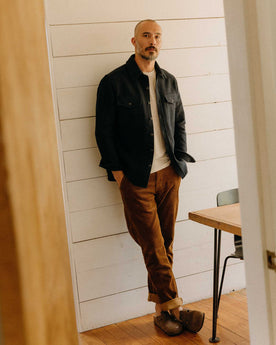 fit model posing in The Maritime Shirt Jacket in Dark Navy Moleskin Twill, Outerwear by Taylor Stitch