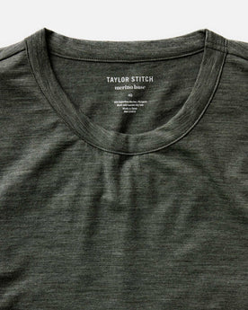 material shot of the collar on The Merino Long Sleeve Tee in Heather Army, Knits by Taylor Stitch
