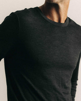 fit model showing off The Merino Long Sleeve Tee in Heather Black, Knits by Taylor Stitch