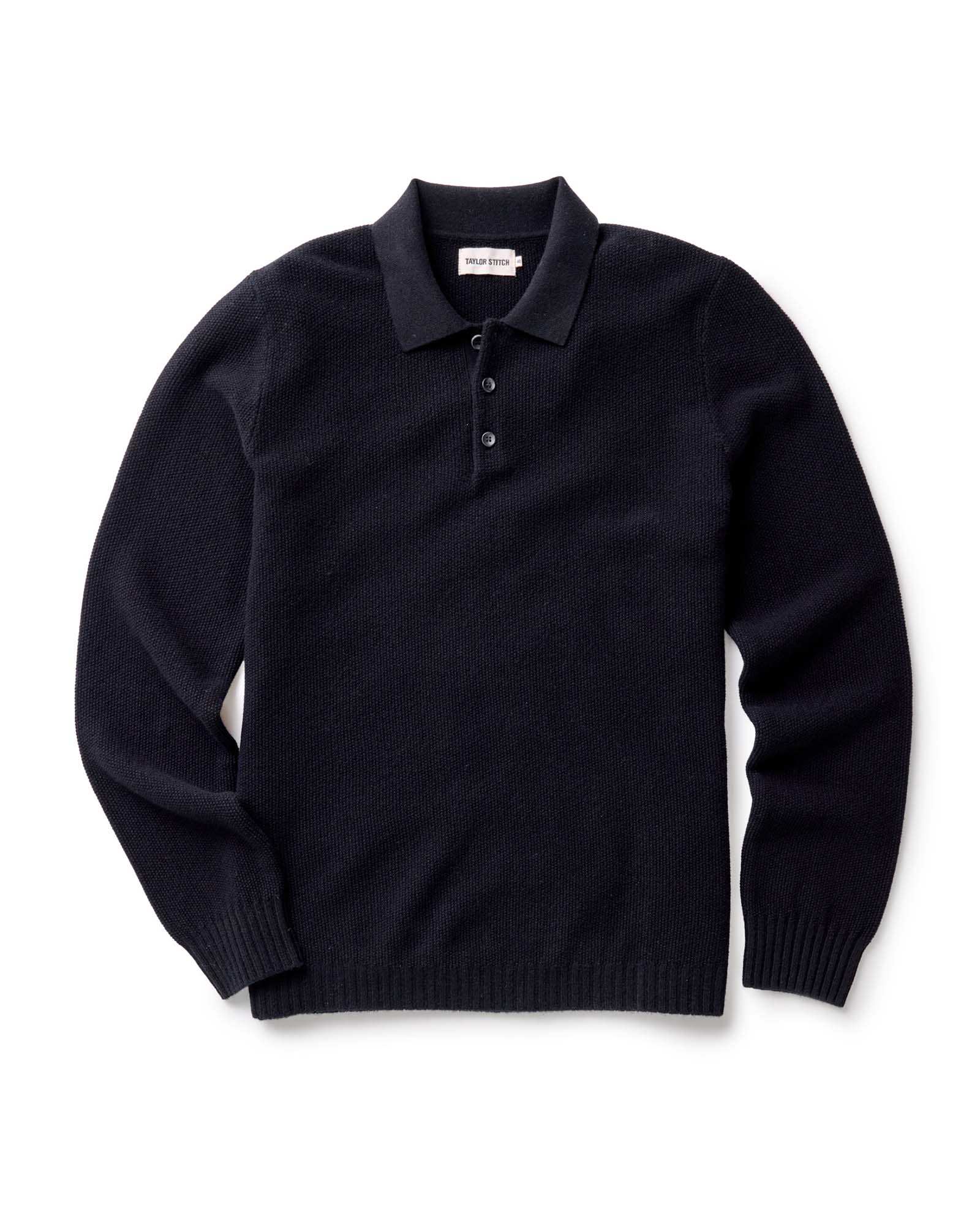 flatlay of The Newton Sweater Polo in Midnight Merino, Knits by Taylor Stitch