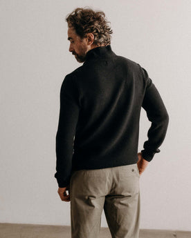 fit model showing off The Newton Sweater Polo in Midnight Merino, Knits by Taylor Stitch