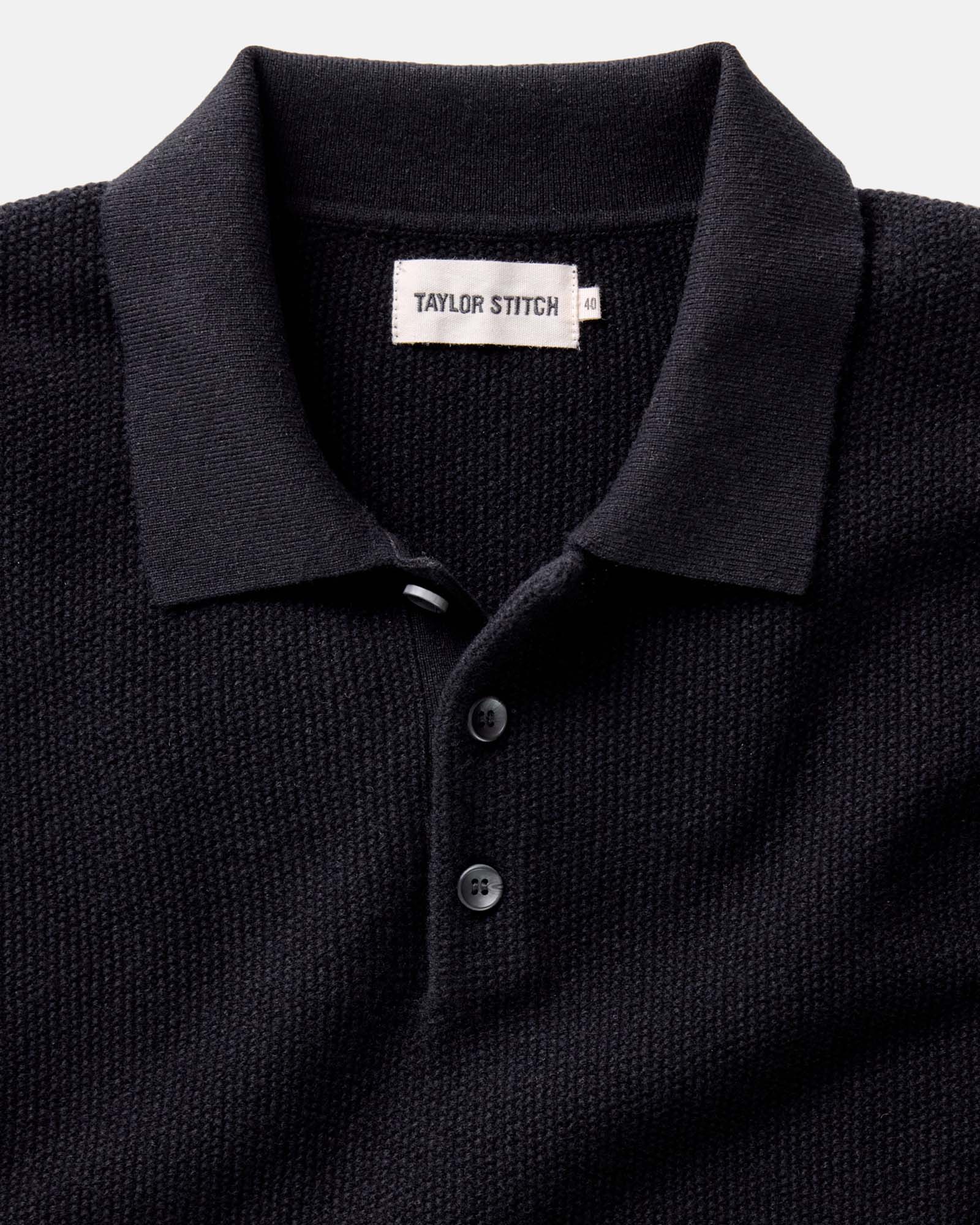 material shot of the collar on The Newton Sweater Polo in Midnight Merino, Knits by Taylor Stitch
