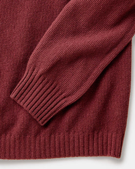 material shot of the sleeves on The Newton Sweater Polo in Dried Cherry Merino, Knits by Taylor Stitch