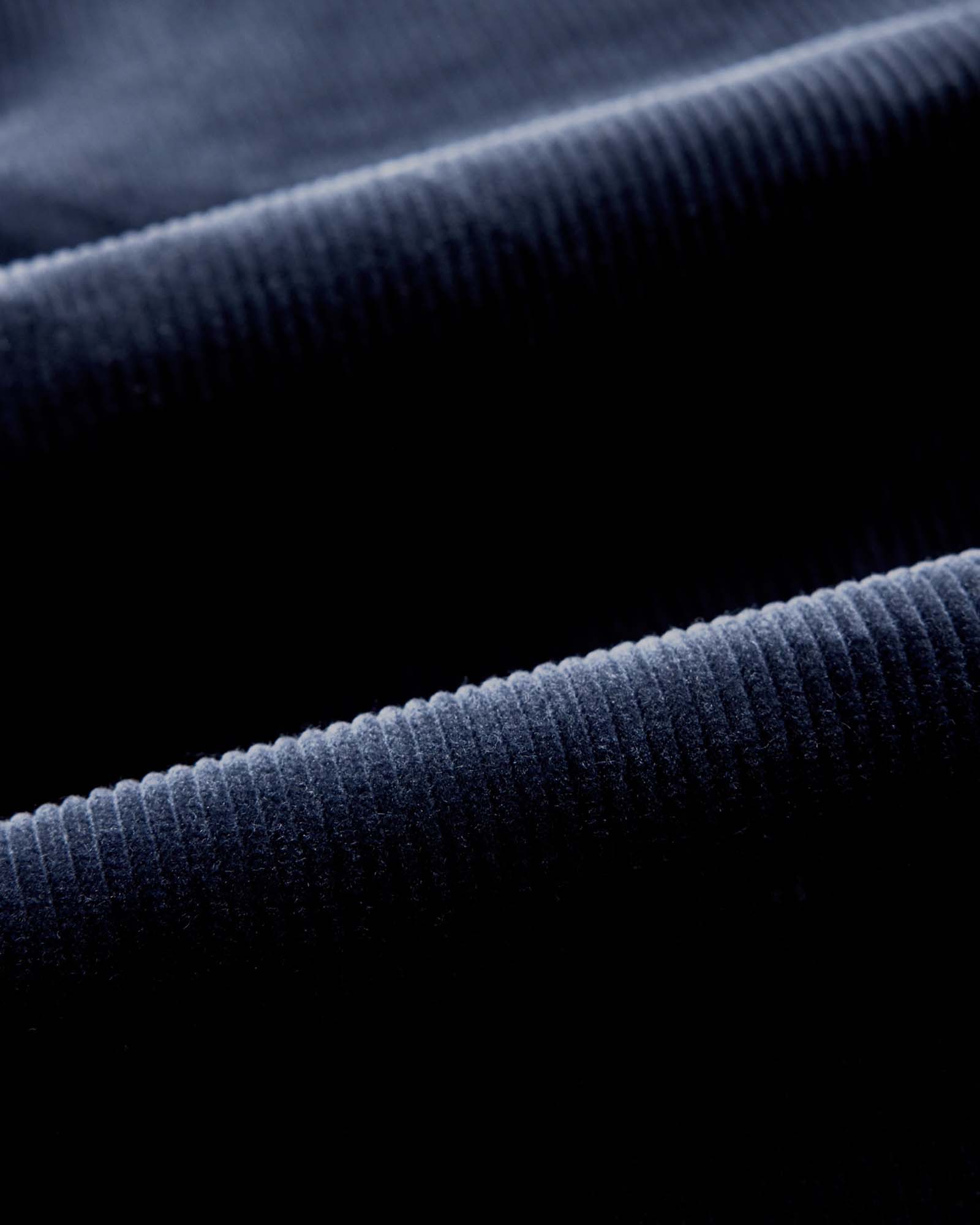 material shot of the fabric on The Ojai Jacket in Dark Navy Corduroy, Outerwear by Taylor Stitch