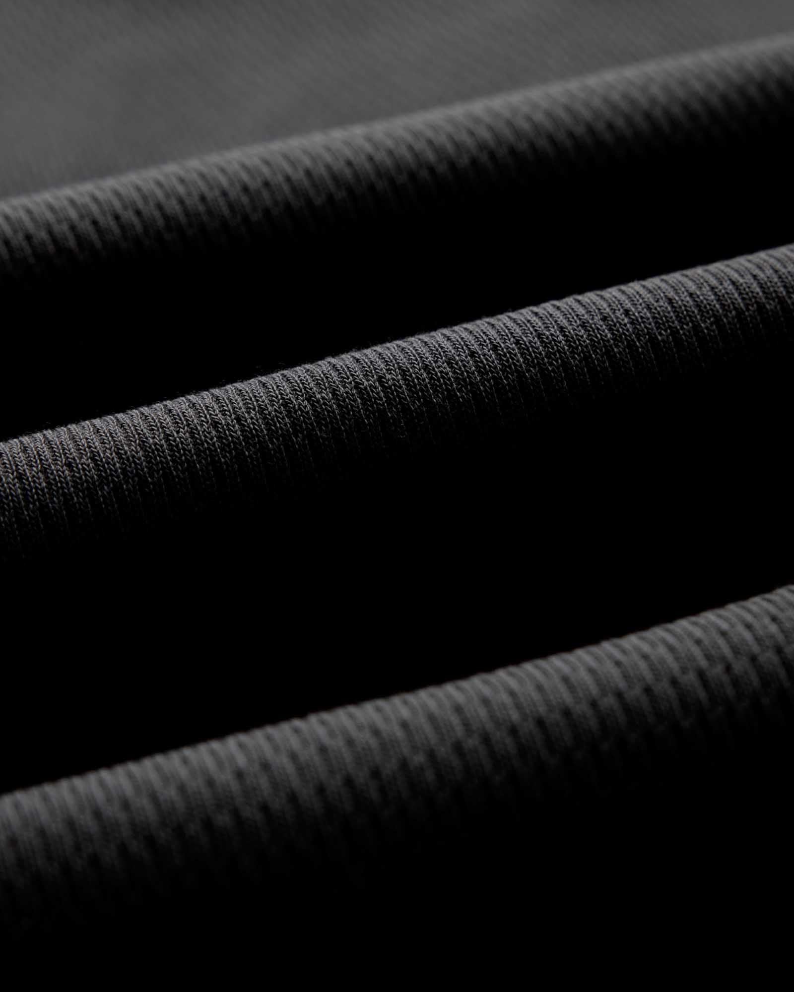 material shot of the fabric on The Organic Cotton Crew in Faded Black Waffle, Knits by Taylor Stitch
