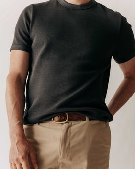 fit model wearing The Organic Cotton Short Sleeve Crew in Faded Black Waffle, Knits by Taylor Stitch