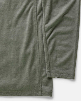material shot of the sleeves on The Ridgeline Merino Half Zip in Field Olive, Knits by Taylor Stitch