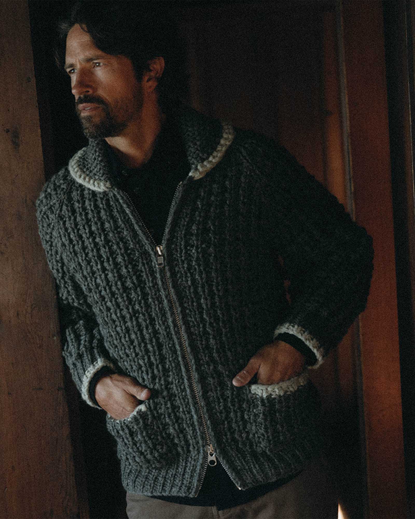 fit model posing in The Seawall Hand-Knit Sweater in Heather Graphite, Knits by Taylor Stitch