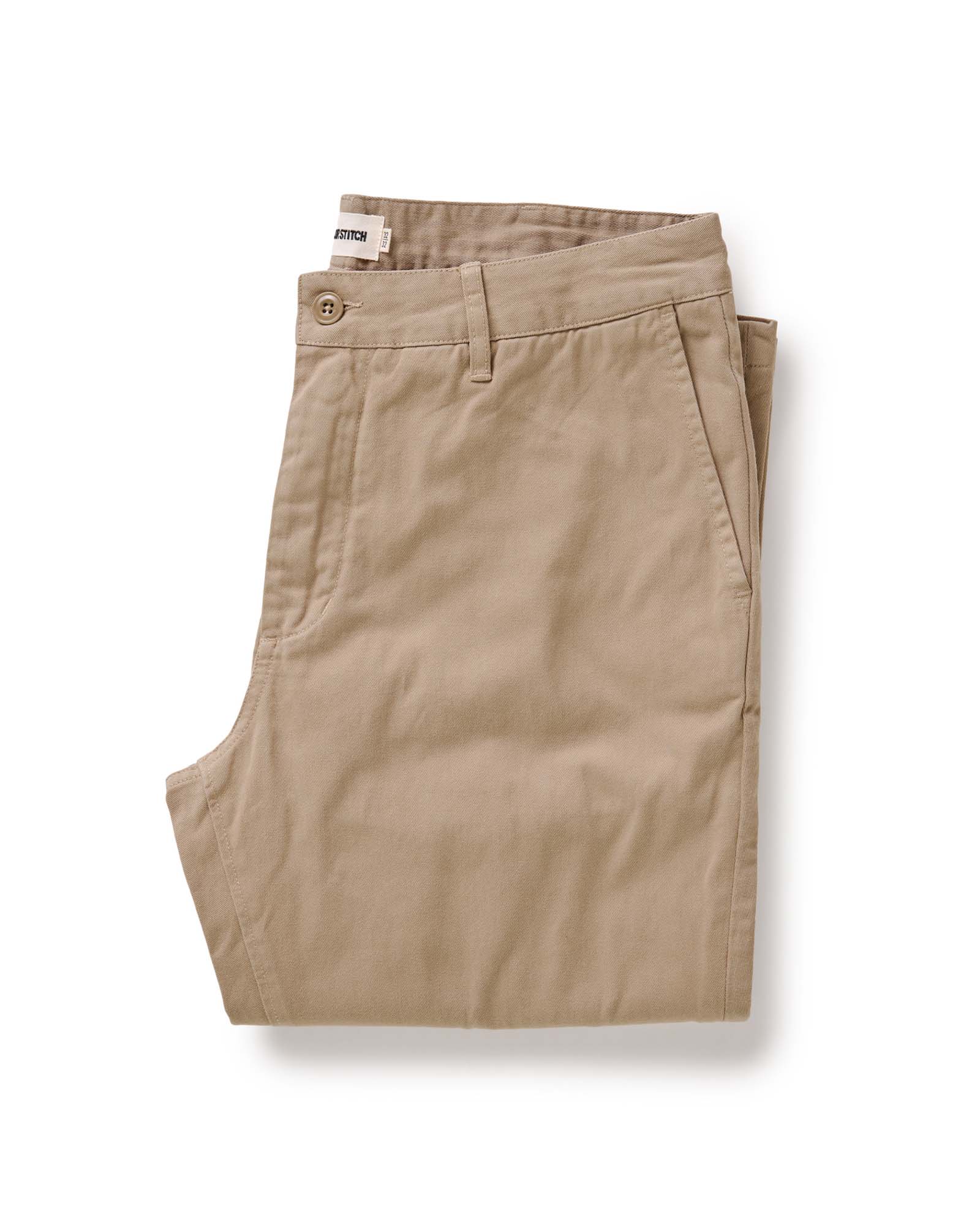 folded flatlay of The Slim Foundation Pant in Organic Khaki, Bottoms by Taylor Stitch