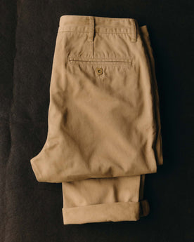 fit model posing in The Slim Foundation Pant in Organic Khaki, Bottoms by Taylor Stitch