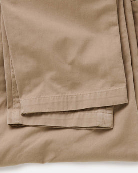 flatlay of The Slim Foundation Pant in Organic Khaki, Bottoms by Taylor Stitch