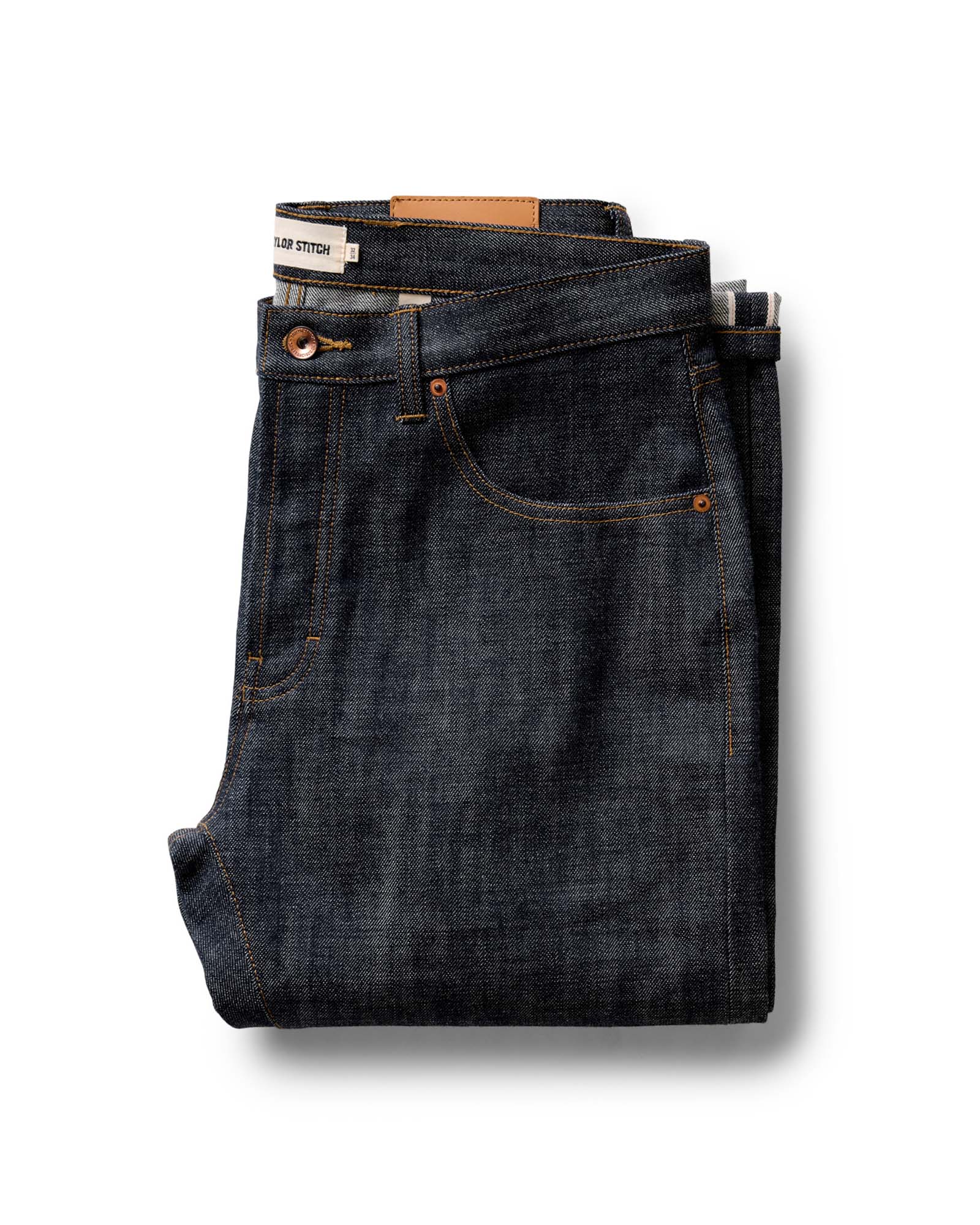folded flatlay of The Slim Jean in Rigid Organic Selvedge, Bottoms by Taylor Stitch