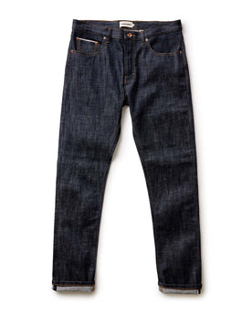 fit model showing off cuffs on The Slim Jean in Rigid Organic Selvedge, Bottoms by Taylor Stitch