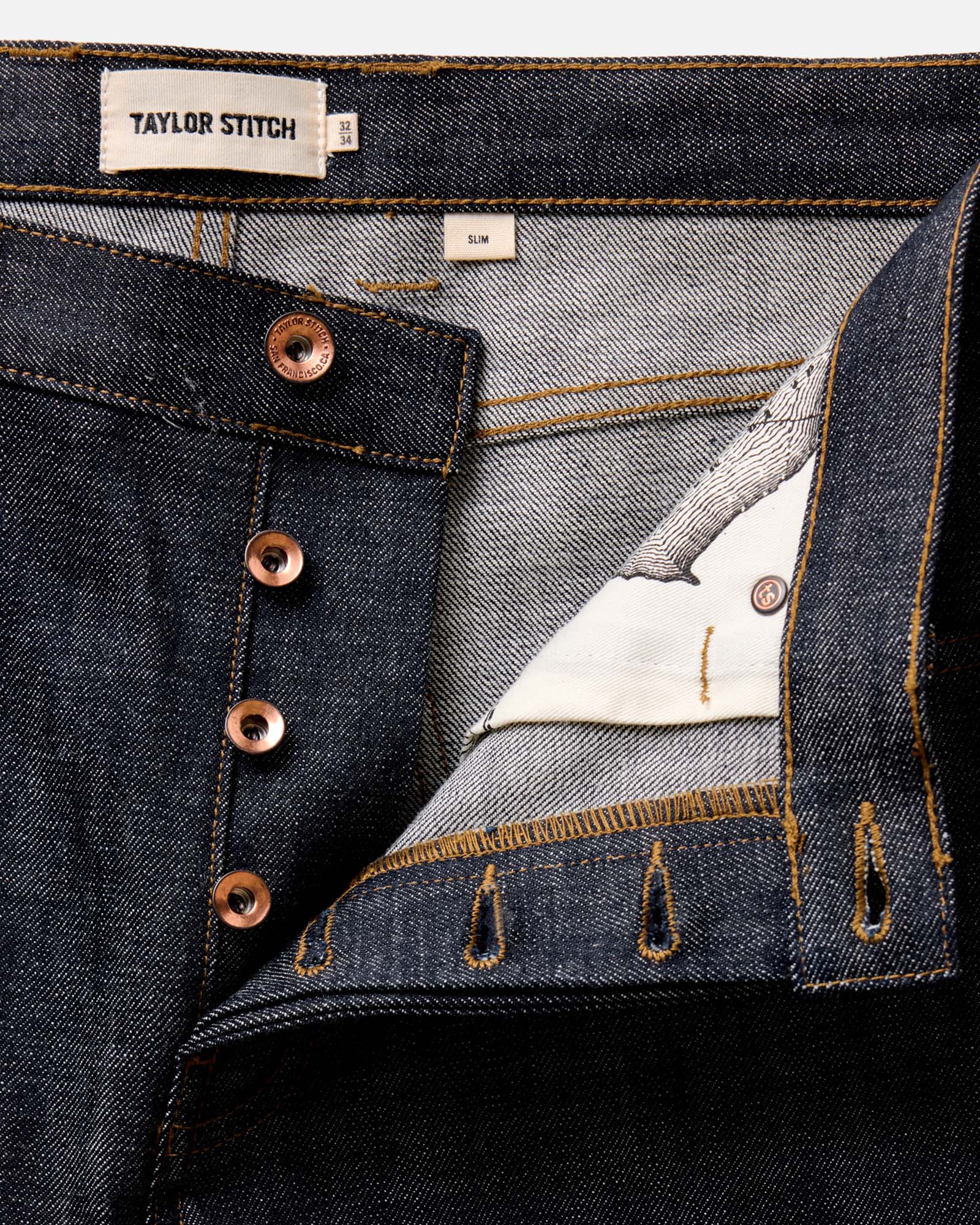 flatlay of The Slim Jean in Rigid Organic Selvedge, Bottoms by Taylor Stitch