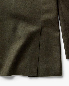 material shot of the back slit on The Stevens Sportcoat in Black Olive Wool Flannel, Outerwear by Taylor Stitch