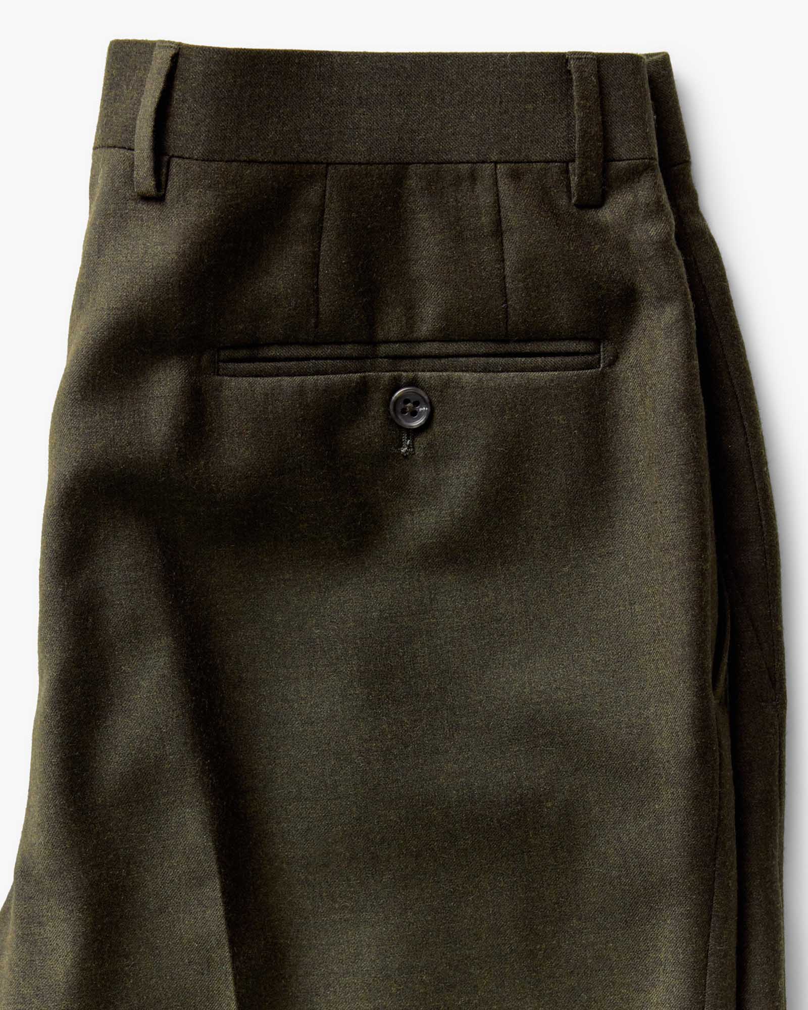 material shot of the back pocket on The Stevens Trouser in Black Olive Wool Flannel, Bottoms by Taylor Stitch