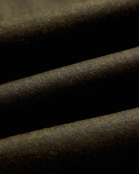 material shot of the fabric on The Stevens Trouser in Black Olive Wool Flannel, Bottoms by Taylor Stitch