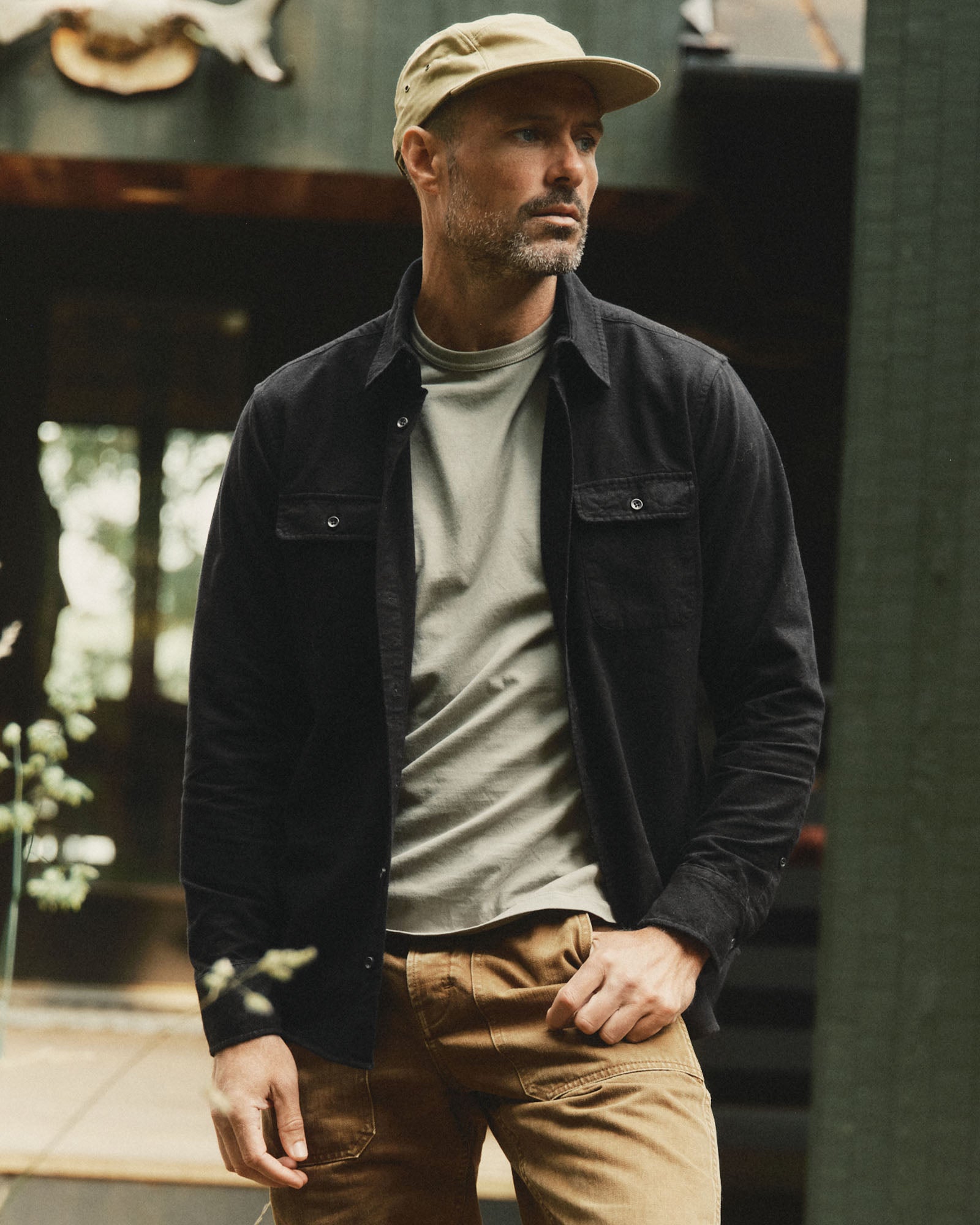 fit model showing off The Yosemite Shirt in Coal, Wovens by Taylor Stitch