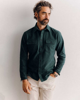 fit model posing in The Yosemite Shirt in Dark Forest, Wovens by Taylor Stitch