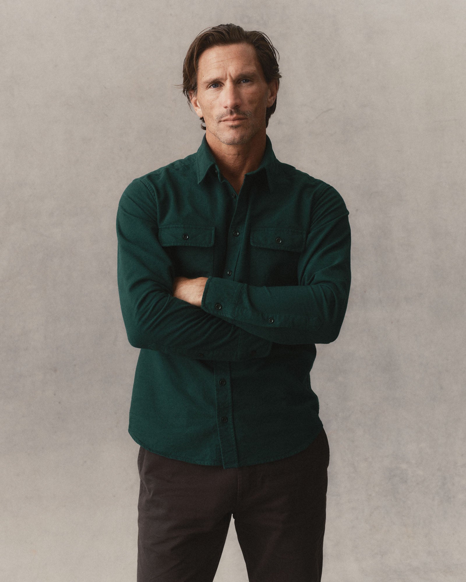 fit model showing off The Yosemite Shirt in Dark Forest, Wovens by Taylor Stitch