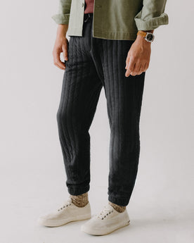 fit model posing in The Apres Pant in Heather Coal Quilted Jersey, Bottoms by Taylor Stitch