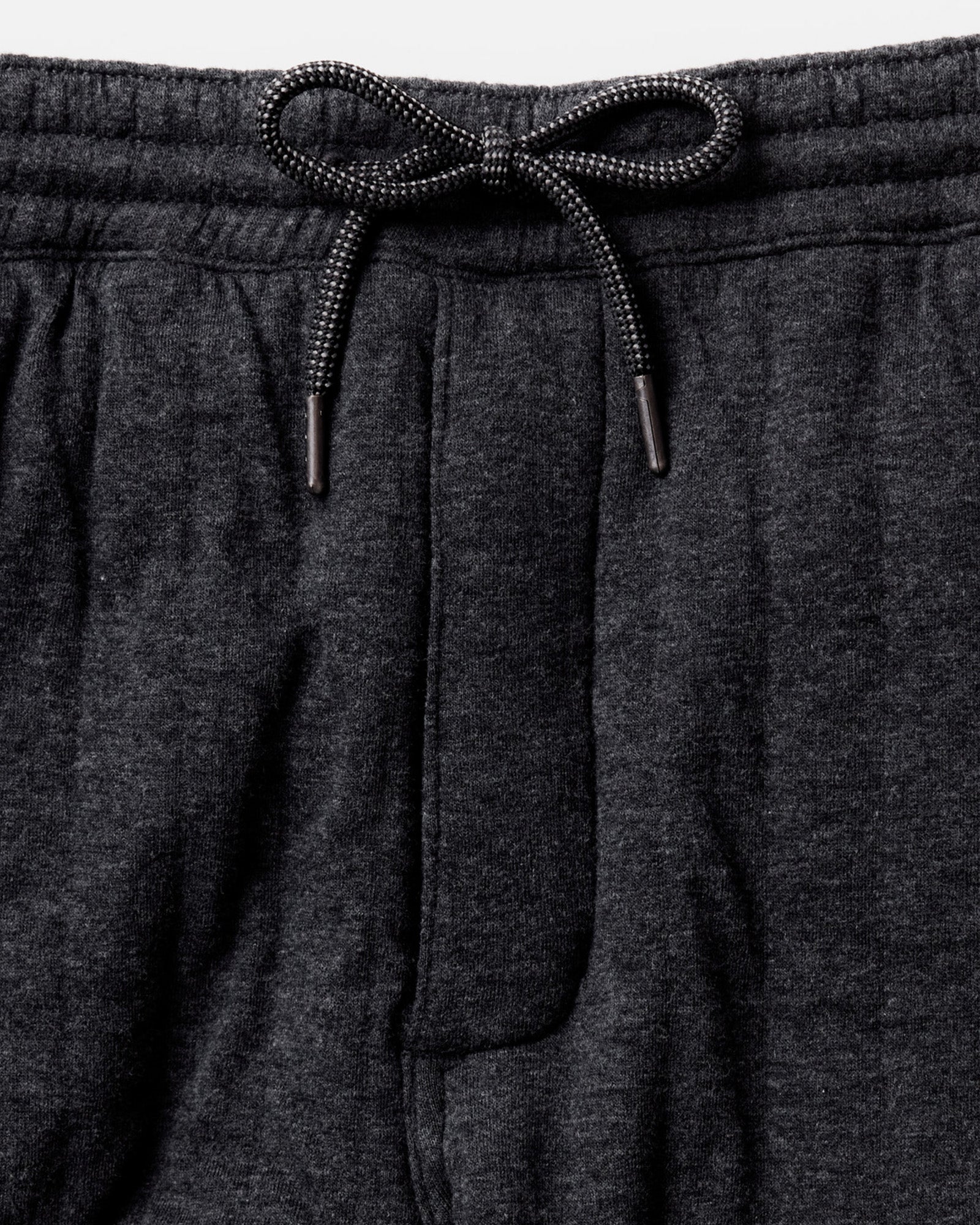 material shot of the waistband on The Apres Pant in Heather Coal Quilted Jersey, Bottoms by Taylor Stitch
