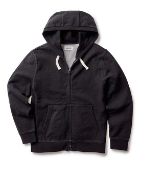 flatlay of The Apres Zip Hoodie in Black Indigo Terry, Knits by Taylor Stitch