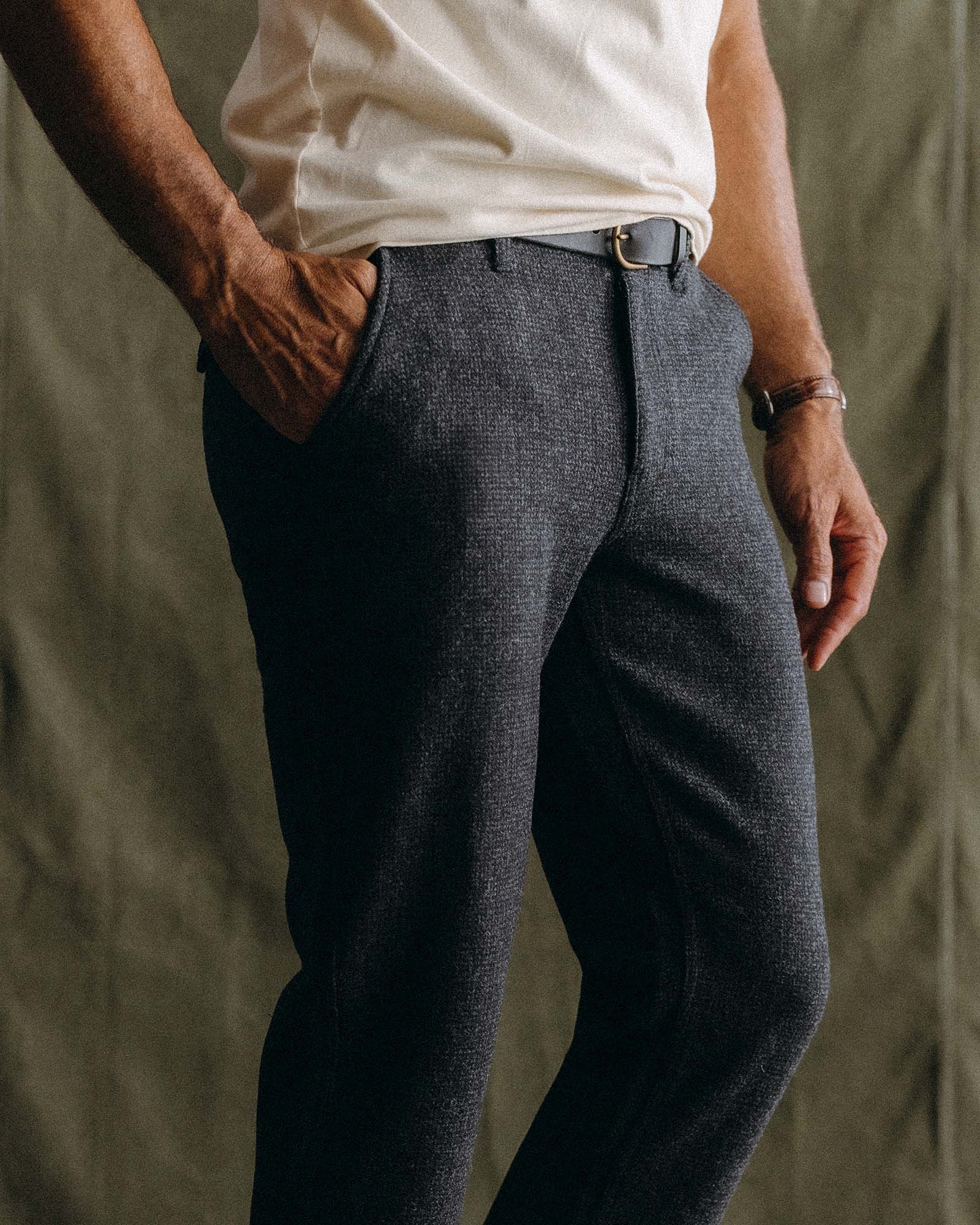 fit model sitting wearing The Carnegie Pant in Heather Charcoal Wool, Bottoms by Taylor Stitch