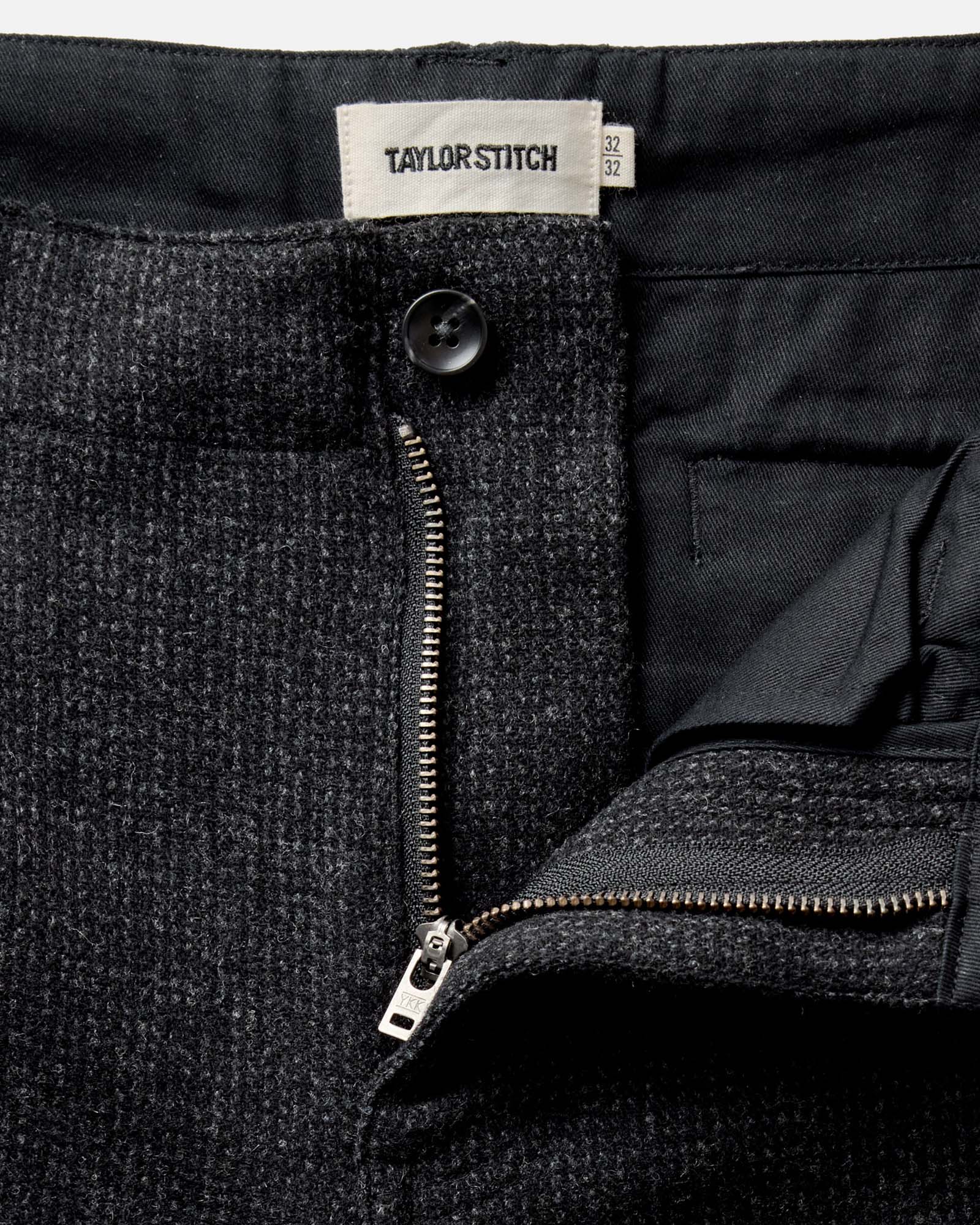 material shot of the waistband on The Carnegie Pant in Heather Charcoal Wool, Bottoms by Taylor Stitch