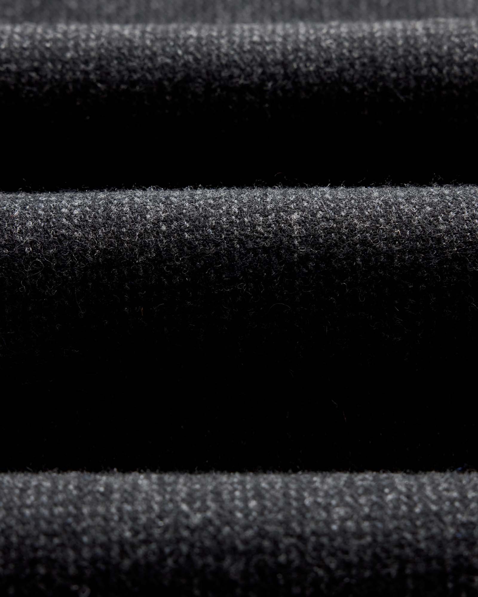 editorial image of the fabric on The Carnegie Pant in Heather Charcoal Wool, Bottoms by Taylor Stitch