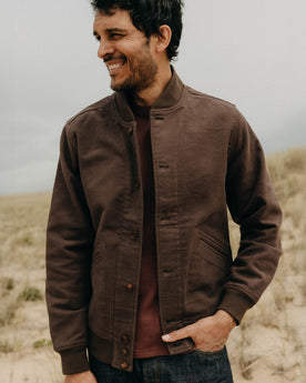 fit model posing in The Clark Bomber in Soil Moleskin, Outerwear by Taylor Stitch