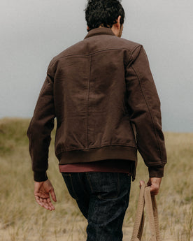 fit model showing off the back of The Clark Bomber in Soil Moleskin, Outerwear by Taylor Stitch