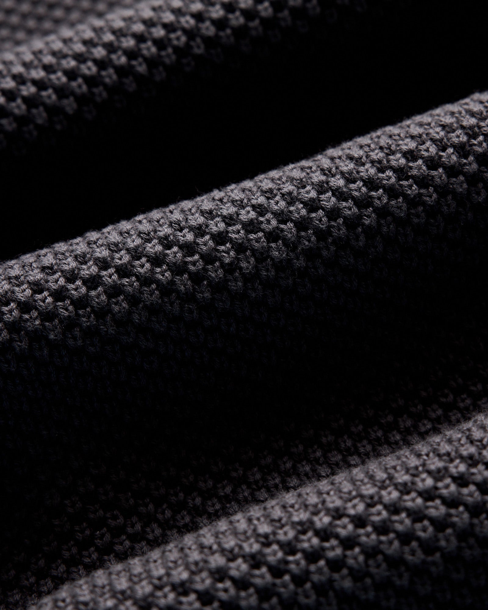 material shot of the fabric on The Crawford Sweater in Charcoal, Knits by Taylor Stitch