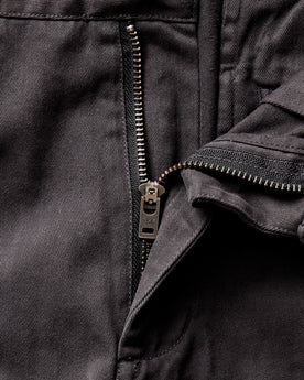 material shot of the YKK zipper fly on The Democratic Foundation Pant in Organic Faded Black, Bottoms by Taylor Stitch