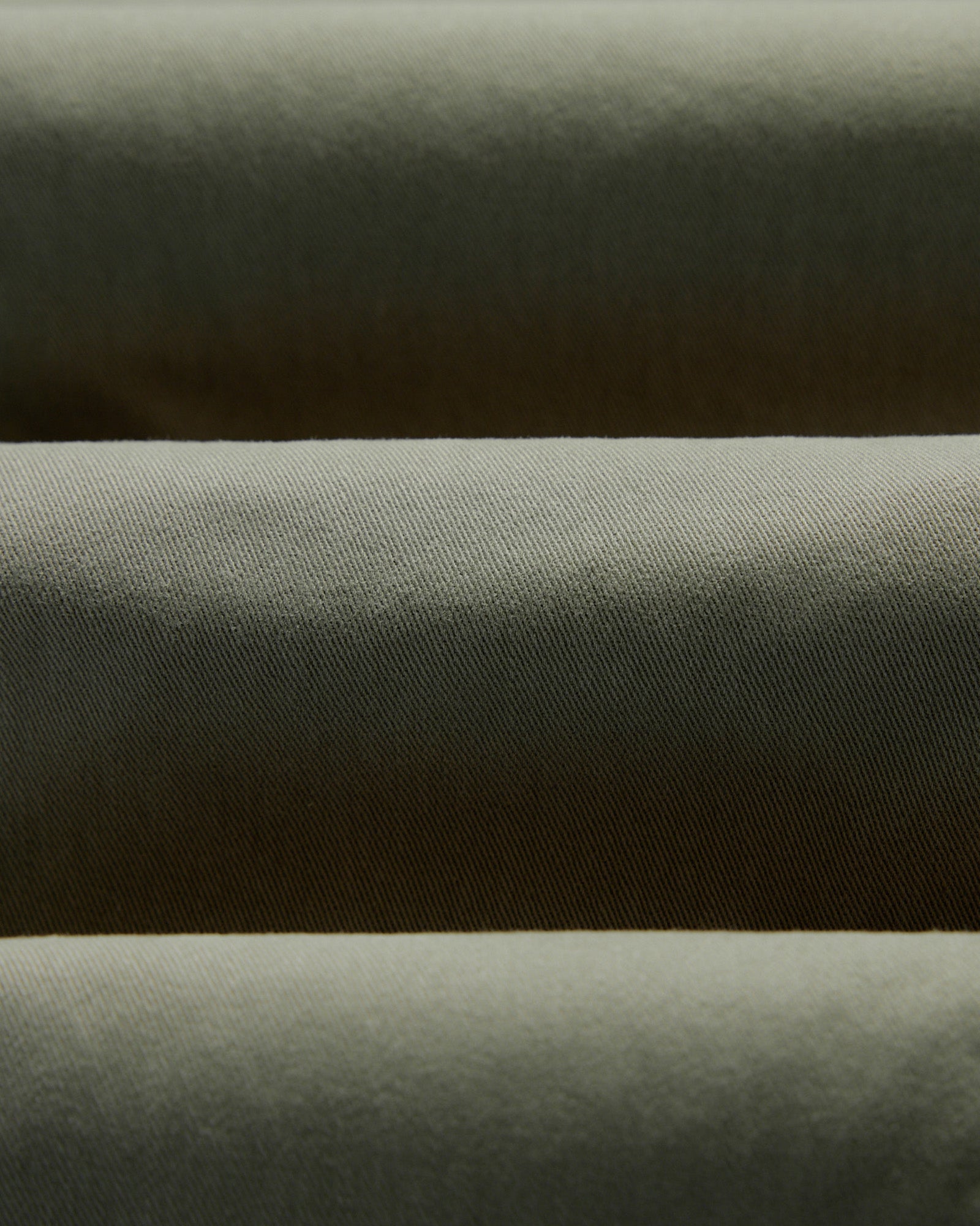 material shot of the twill fabric on The Democratic Foundation Pant in Organic Smoked Olive, Bottoms by Taylor Stitch