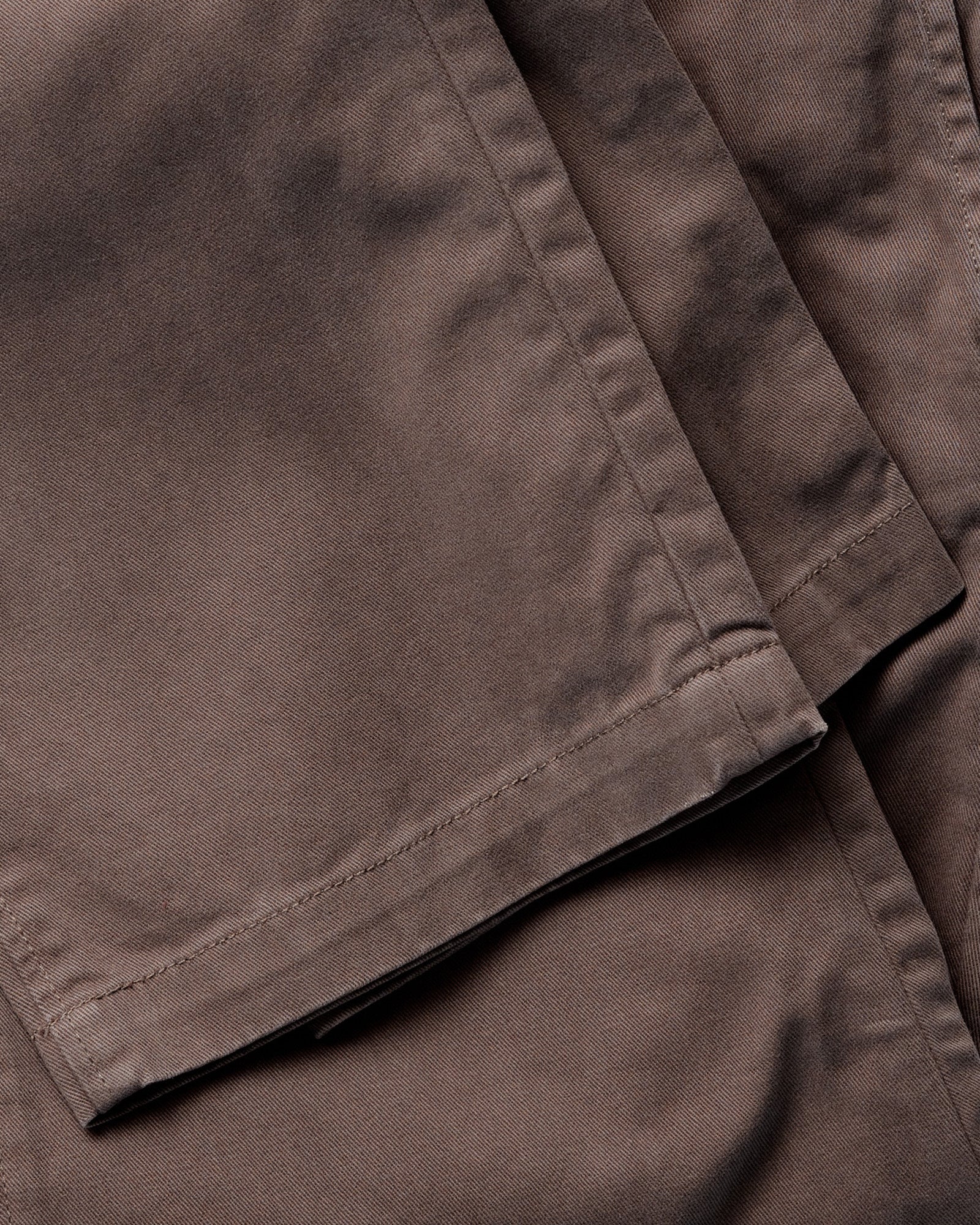 material shot of the leg cuffs on The Democratic Foundation Pant in Organic Espresso, Bottoms by Taylor Stitch