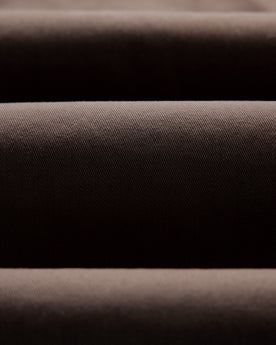 material shot of the twill fabric on The Democratic Foundation Pant in Organic Espresso, Bottoms by Taylor Stitch