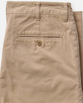 material shot of the back button-through pocket on The Democratic Foundation Pant in Organic Khaki, Bottoms by Taylor Stitch