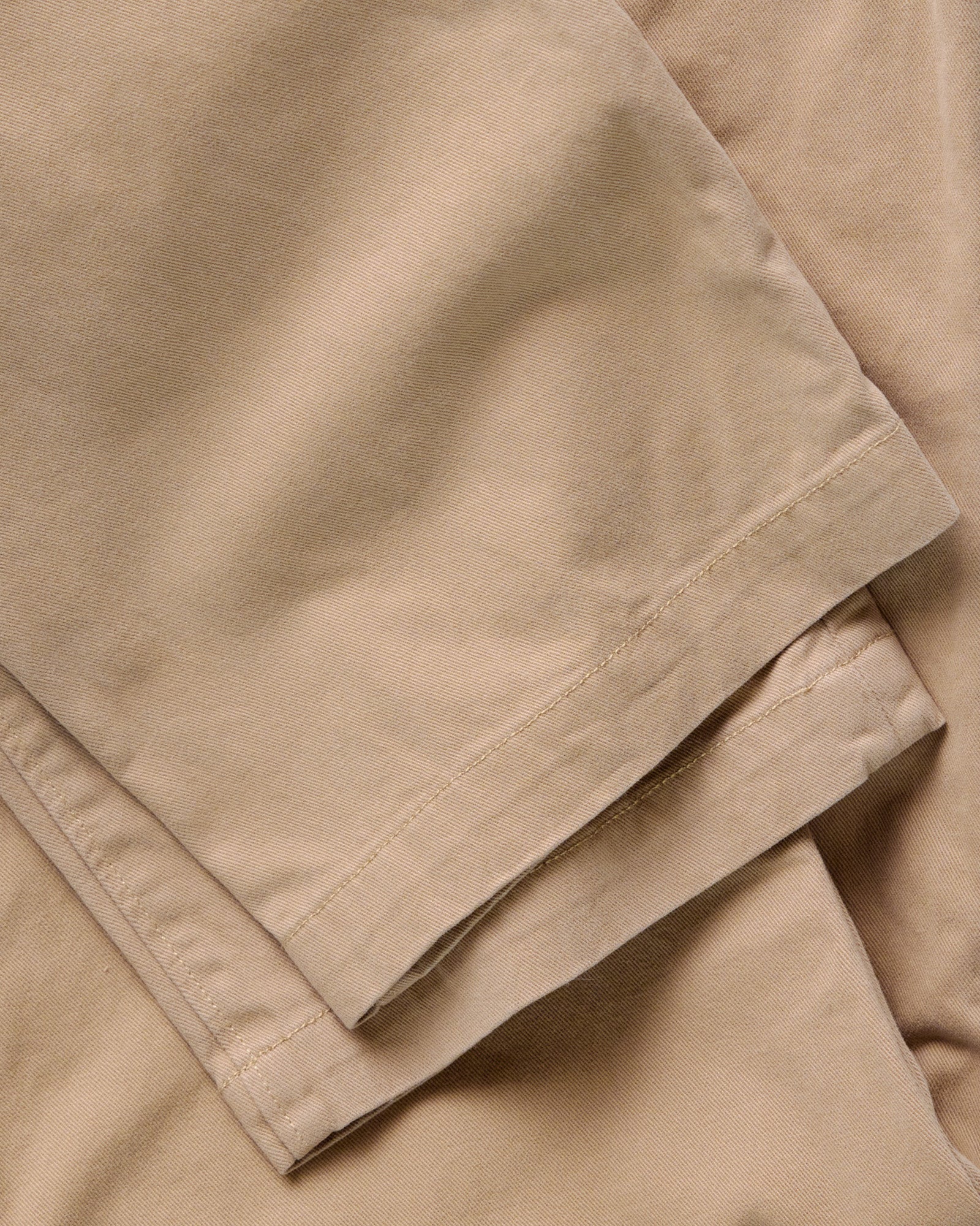 material shot of the leg cuffs on The Democratic Foundation Pant in Organic Khaki, Bottoms by Taylor Stitch
